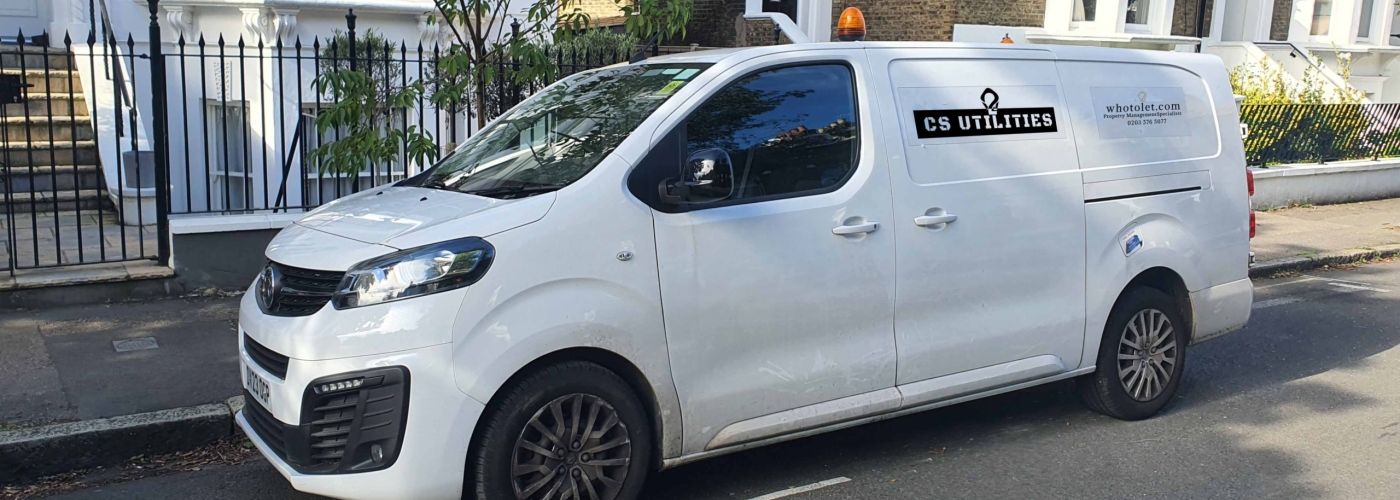 w2l cleaning van parked on a residential street